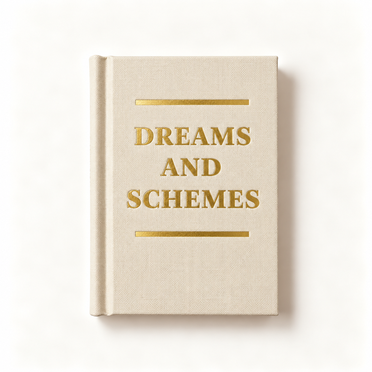 Dreams and Schemes A7 fabric hardback notebook by Ohh Deer, cream linen cover with gold lettering between gold rules, studio shot
