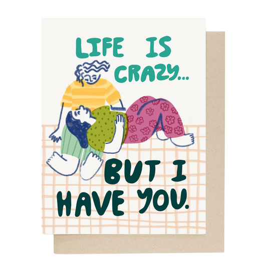 Life Is Crazy card by People I've Loved with two friends lounging on a checked blanket