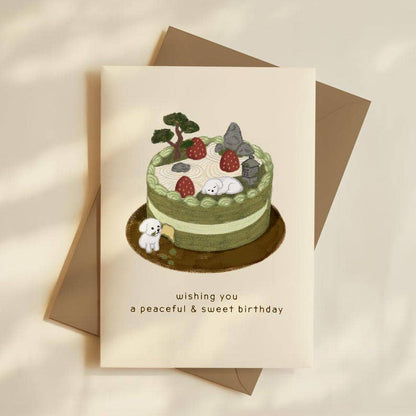 Zen Garden Dog Birthday Card by Hoshi – detail of bonsai, stone lantern, and raked sand