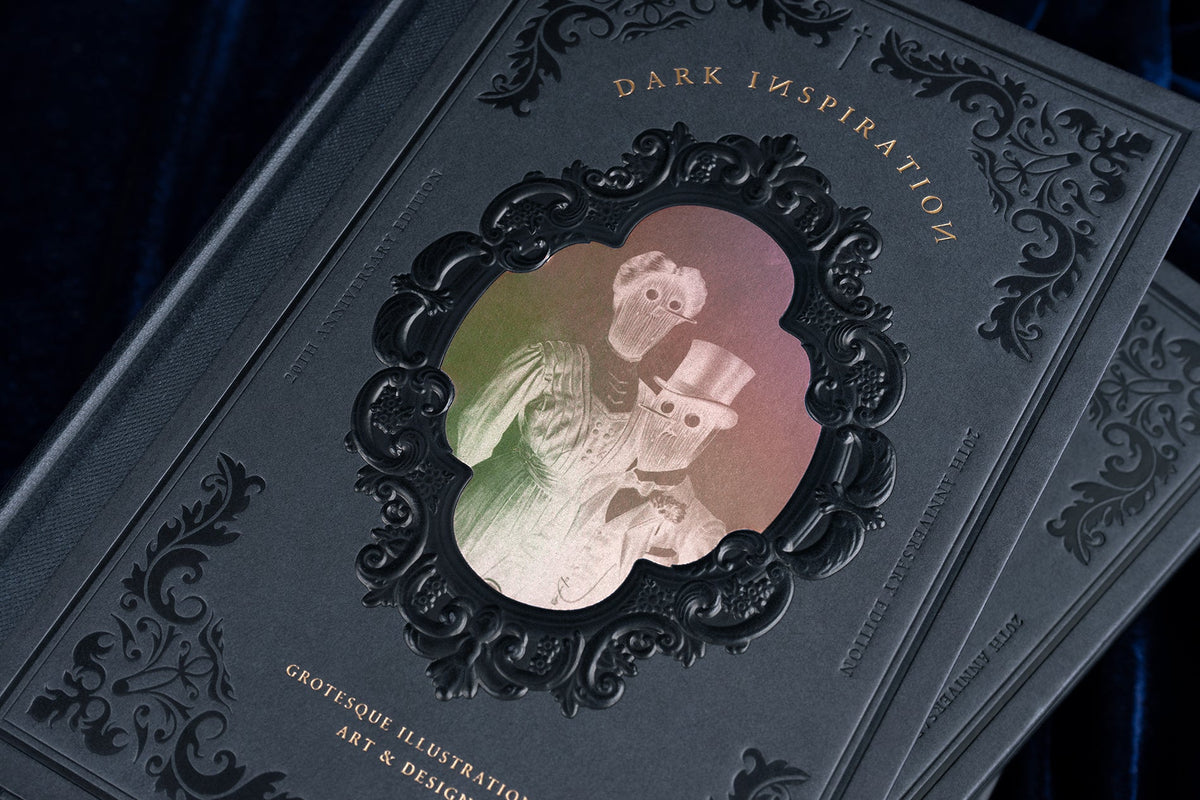 Close-up of the ornate embossed cover of Dark Inspiration