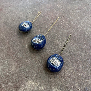 Handmade Ceramic Tamagotchi Pendants | Mylan Nguyen (TX)