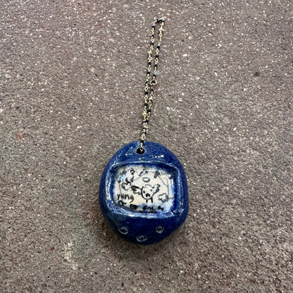 Handmade Ceramic Tamagotchi Pendants | Mylan Nguyen (TX)