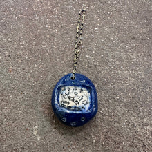 Load image into Gallery viewer, Handmade Ceramic Tamagotchi Pendants | Mylan Nguyen (TX)
