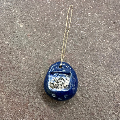 Handmade Ceramic Tamagotchi Pendants | Mylan Nguyen (TX)