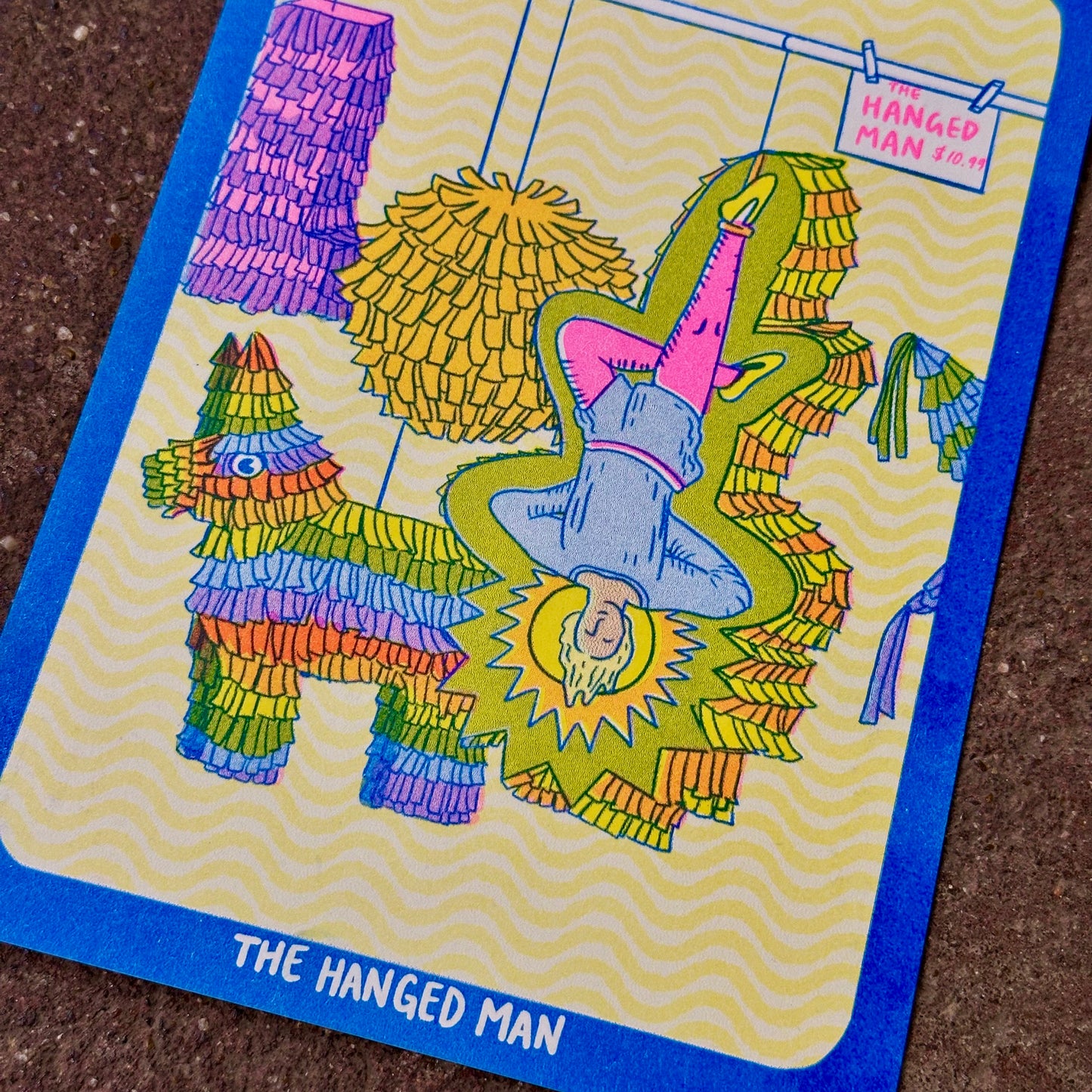 Cornerstore Tarot Risograph Print Postcard | The Hanged Man | Christina Hu (CA)