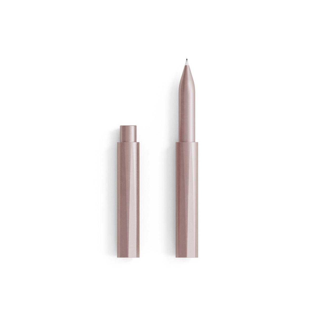 The Wren refillable writing pen in Blush with the cap removed