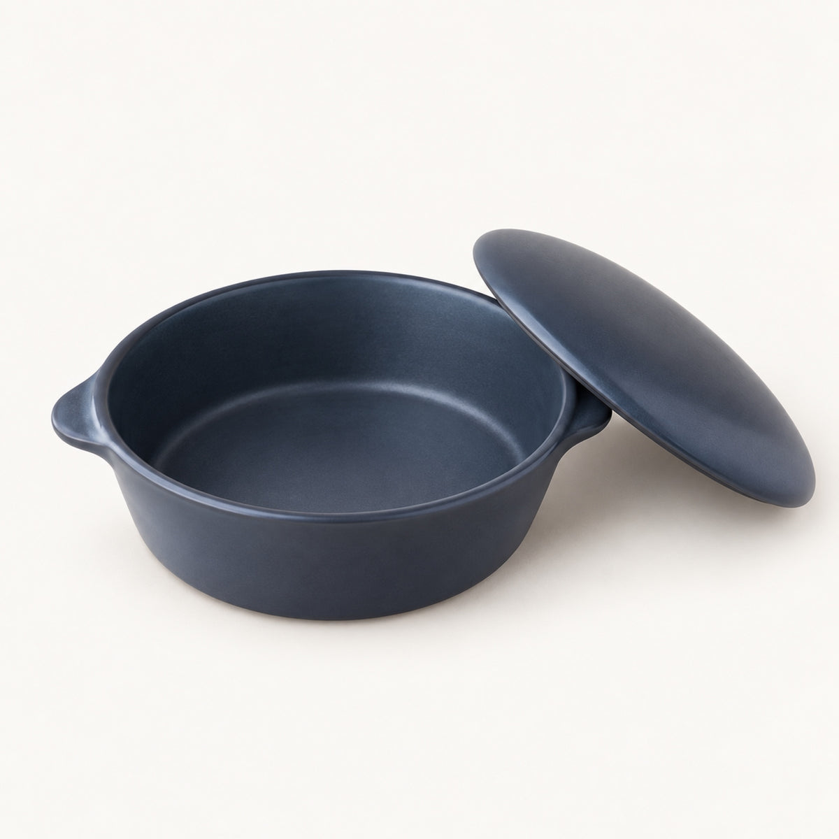 The Chef Bake Pot Mini in Classic Blue with the lid off, showing the inside of the pot