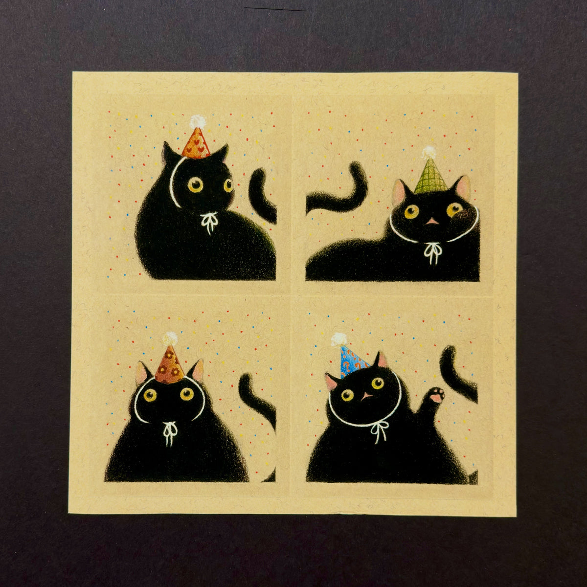 Party Cats in Party Hats art print by Felicia Chiao – shown on display