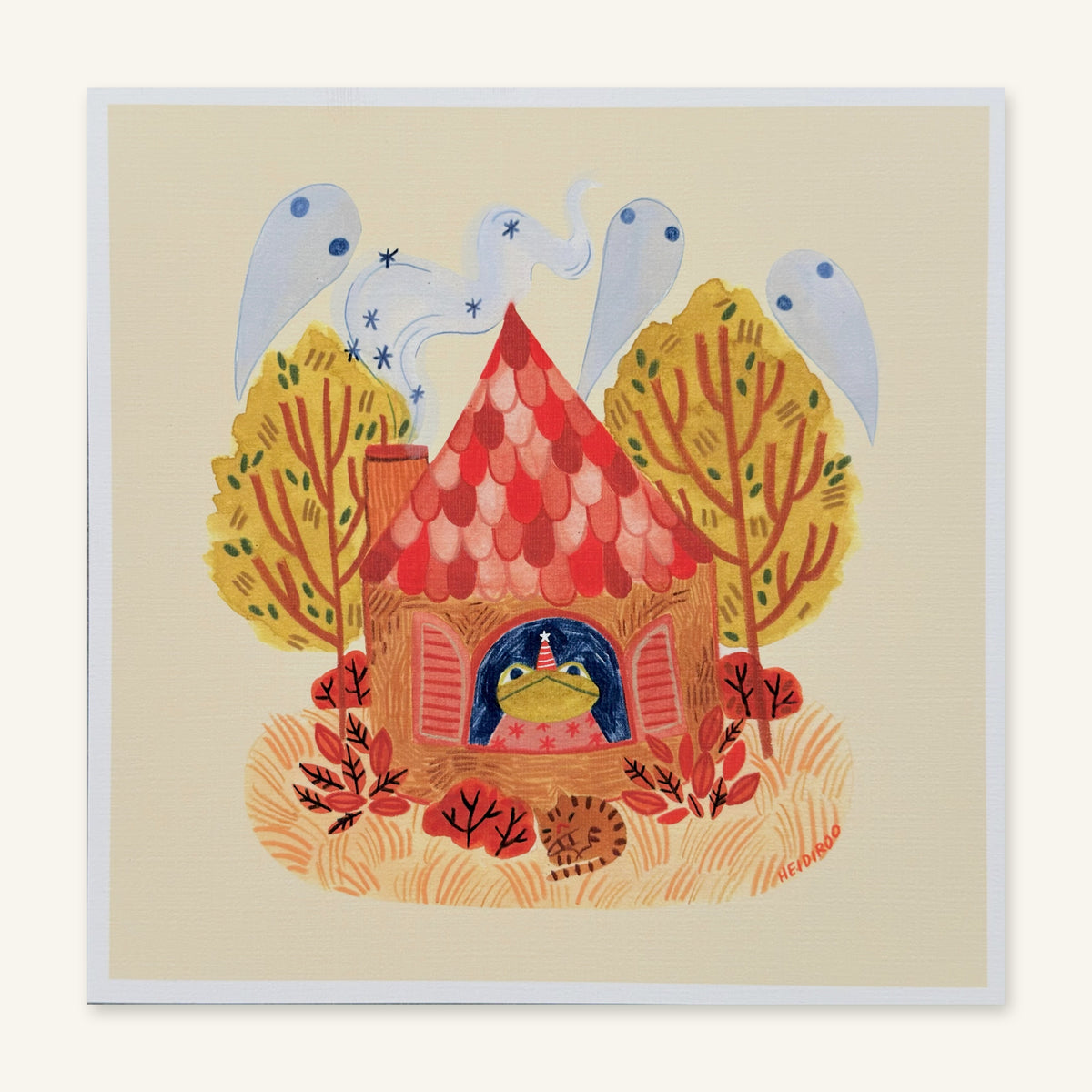 Toad in a party hat looking out the window of a red-roofed cottage with ghosts in the chimney smoke, autumn trees and a sleeping cat, art print by Heidi Moreno shown flat
