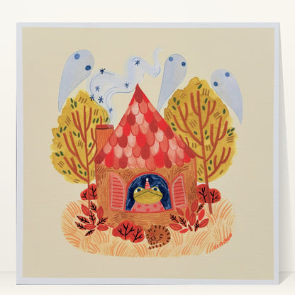 Toad in a party hat looking out the window of a red-roofed cottage with ghosts in the chimney smoke, autumn trees and a sleeping cat, art print by Heidi Moreno