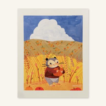 Opossum in a maroon sweater hugging a pumpkin in tall golden grass with pumpkin-dotted hills and a white cloud, art print by Heidi Moreno shown flat