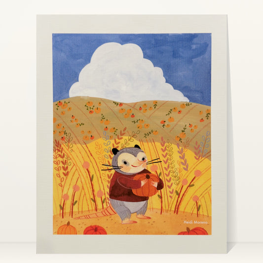 Opossum in a maroon sweater hugging a pumpkin in tall golden grass with pumpkin-dotted hills and a white cloud, art print by Heidi Moreno