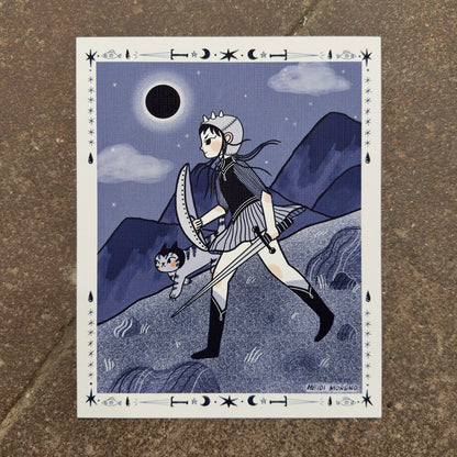 Young warrior with a shield and sword walking with a tabby cat under a total solar eclipse in indigo tones with a tarot-style border, art print by Heidi Moreno on display at We Are 1976