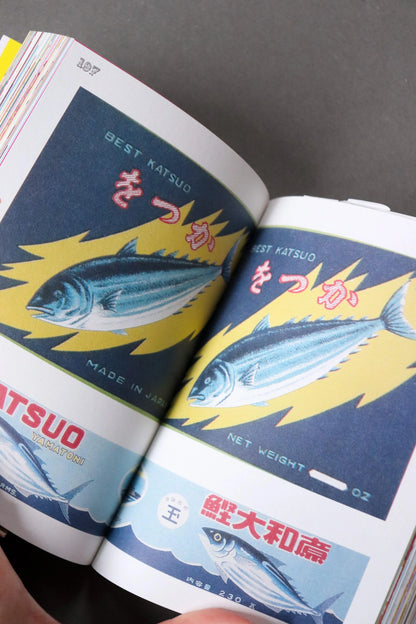 Inside Made in Japan: vintage bonito can labels with leaping blue fish and Japanese lettering