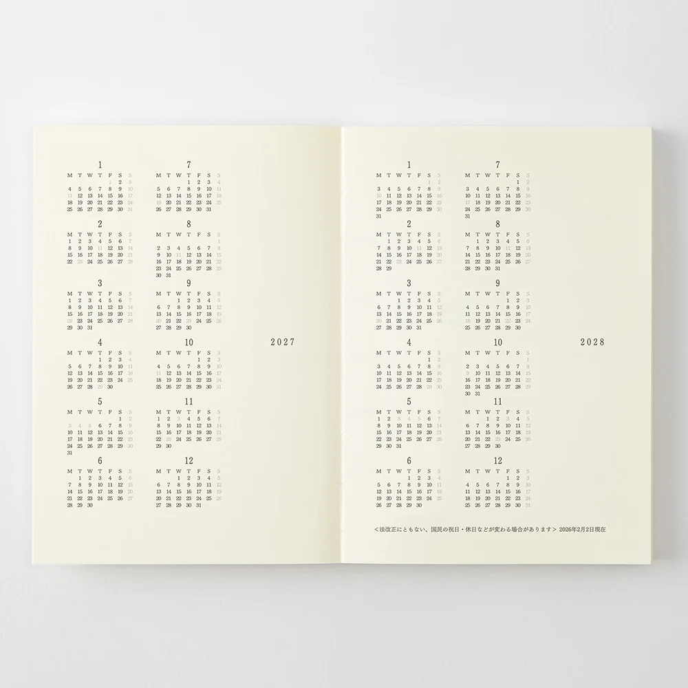 Midori MD Notebook Diary 2027 opened to the 2027 and 2028 yearly calendars