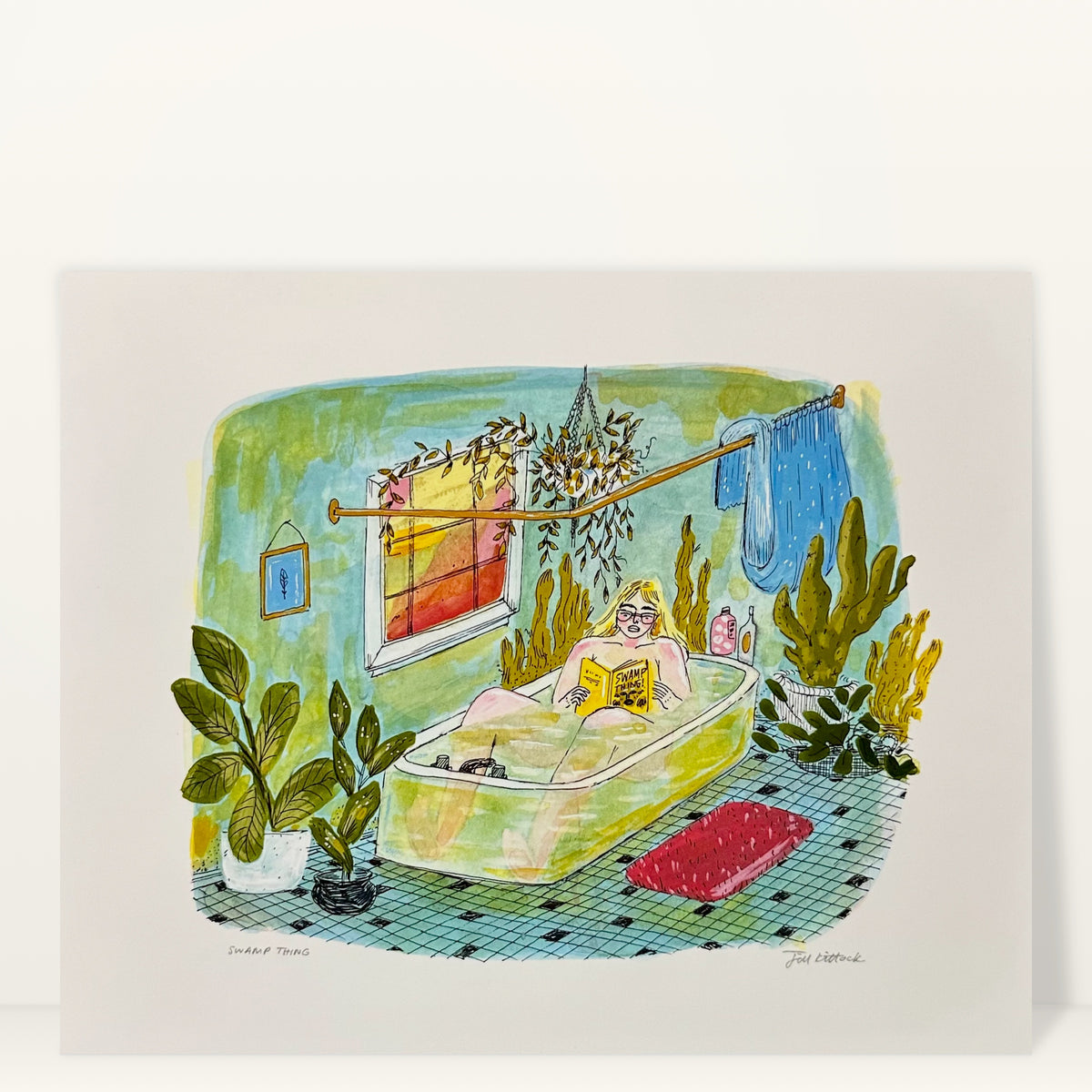 Swamp Thing art print by Jill Kittock, 10 x 8 size, against a light studio wall: a woman reading in a green tub surrounded by plants