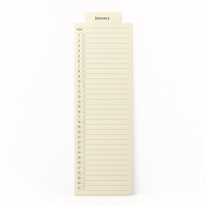 A cream-colored monthly calendar notepad showing the 'January' tab at the top, with numbered days from 1 to 31 on a clean white background.