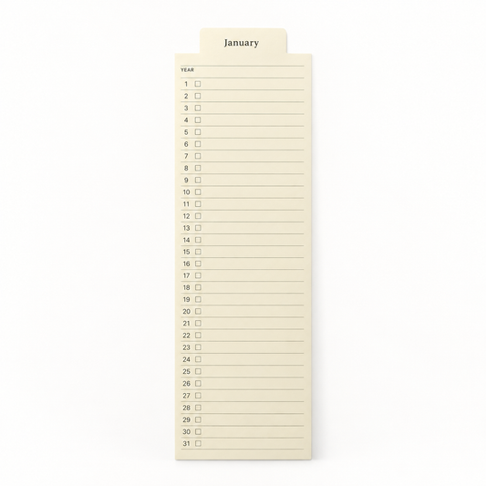 A cream-colored monthly calendar notepad showing the 'January' tab at the top, with numbered days from 1 to 31 on a clean white background.