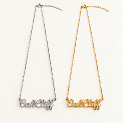 Oak Cliff script name necklaces in silver and gold, side by side