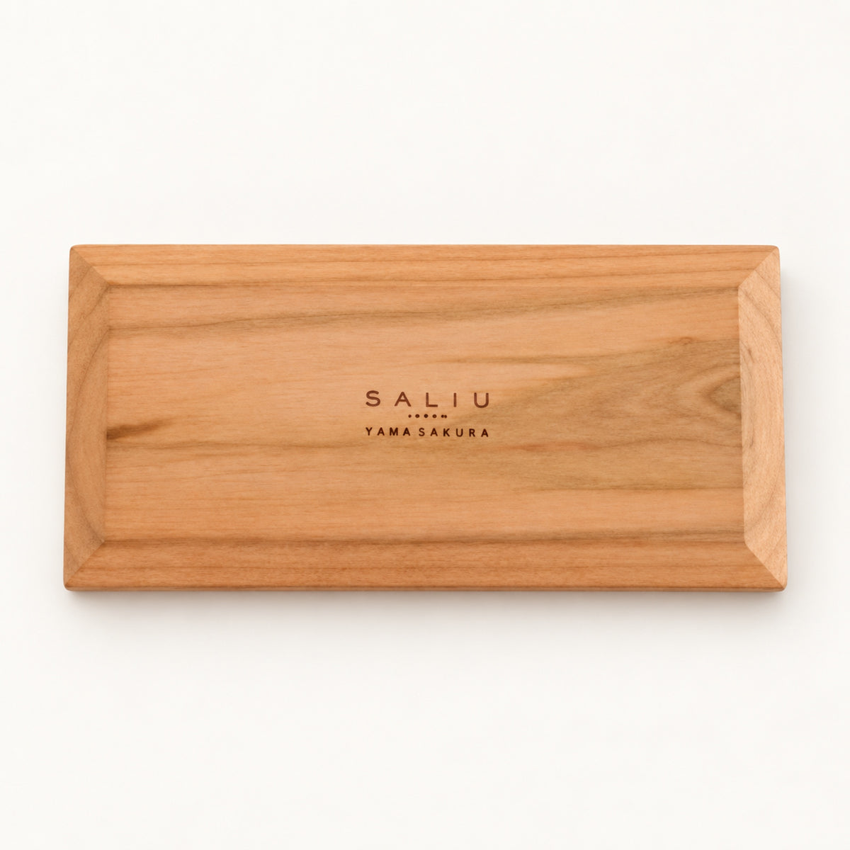 Underside of the SALIU long coaster with the SALIU Yama Sakura brand mark