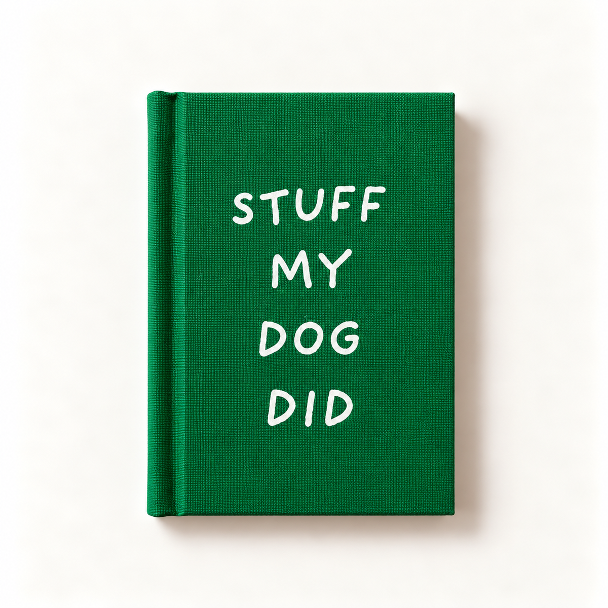 Stuff My Dog Did A7 fabric hardback notebook by Ohh Deer, dark green linen cover with hand-lettered white type, studio shot