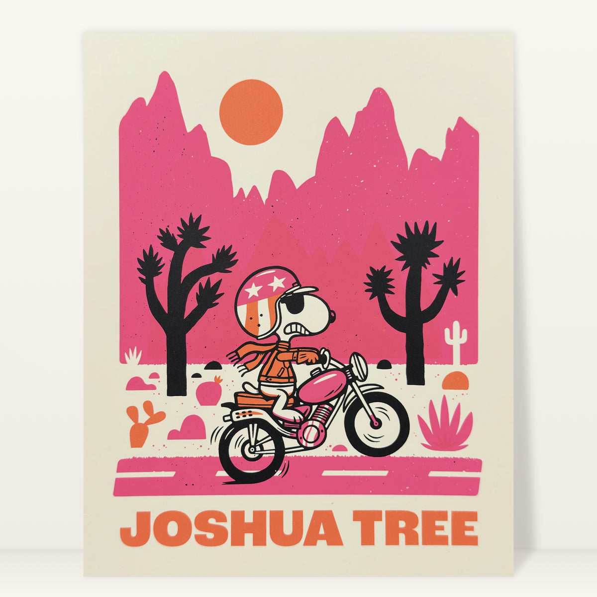 Joshua Tree screenprint by The Little Friends of Printmaking: a rider on a motorbike among Joshua trees under pink mountains