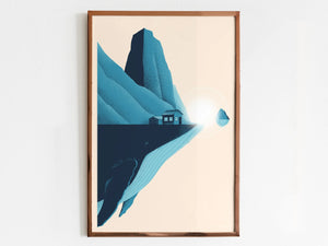 Framed artwork of a mountain landscape with a house, on a beige background