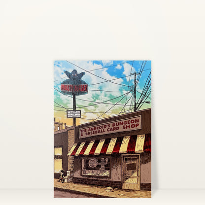 Android's Dungeon (Day) mini print postcard by Tim Doyle: the Android's Dungeon & Baseball Card Shop storefront under a bright cloudy sky