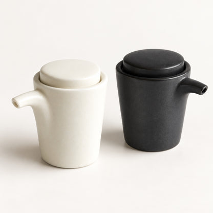 SHIKIKA porcelain soy sauce jugs by SALIU in white and black