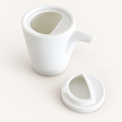 White SHIKIKA soy sauce jug with its lid off, showing the half-moon pour opening